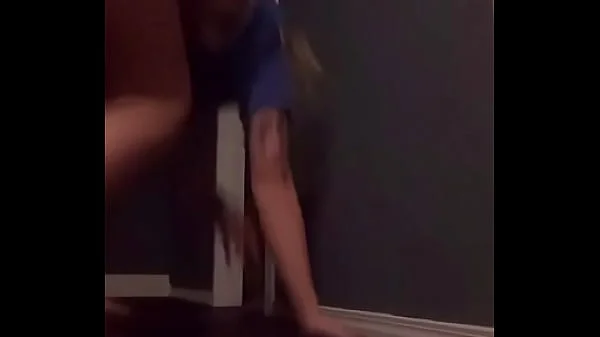 Teen doing a handstand with nip slip